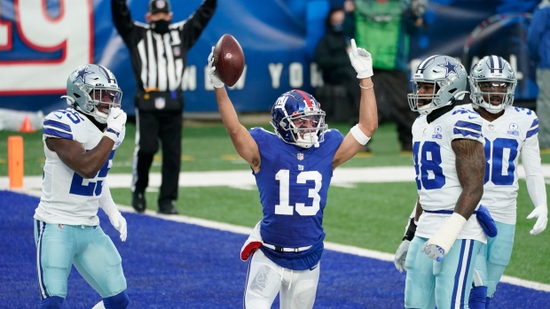 New York Giants' Dante Pettis, center, celebrates against Dallas Cowboys, The Canadian Press New York Giants' Dante Pettis, center, celebrates against Dallas Cowboys