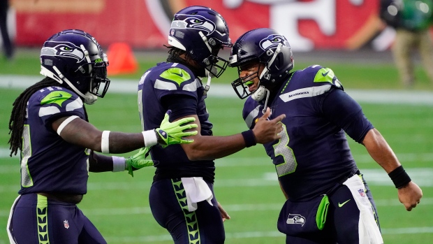 Russell Wilson, The Canadian Press Russell Wilson