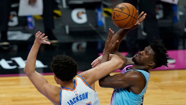 Oklahoma City Thunder forward Justin Jackson defends Miami Heat forward Jimmy Butler 