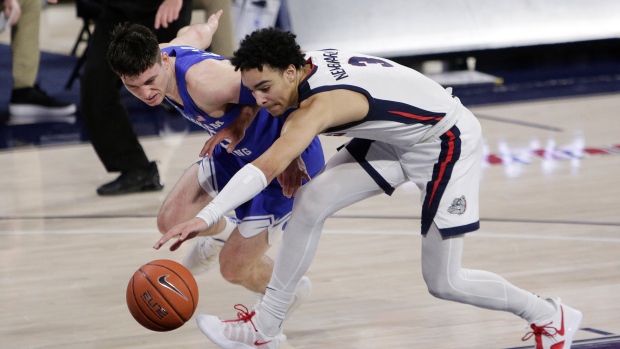 BYU guard Alex Barcello and Gonzaga guard Andrew Nembhard , The Canadian Press BYU guard Alex Barcello and Gonzaga guard Andrew Nembhard