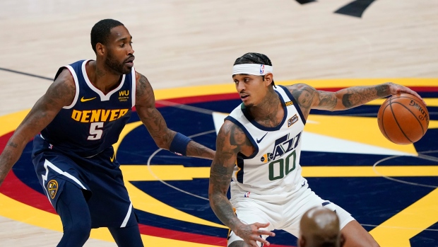 Utah Jazz's Jordan Clarkson, right, and Denver Nuggets' Will Barton 