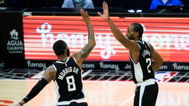 Marcus Morris Sr. and Kawhi Leonard celebrate, The Canadian Press Marcus Morris Sr. and Kawhi Leonard celebrate
