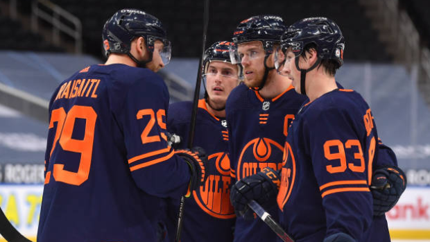 Leon Draisaitl talks with Connor McDavid, Tyson Barrie, and Ryan Nugent-Hopkins, Getty Images Leon Draisaitl talks with Connor McDavid, Tyson Barrie, and Ryan Nugent-Hopkins