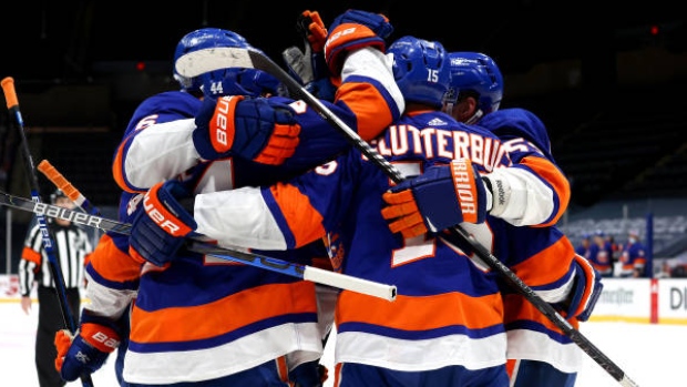 New York Islanders celebrate, Mike Stobe/NHLI via Getty Images New York Islanders celebrate