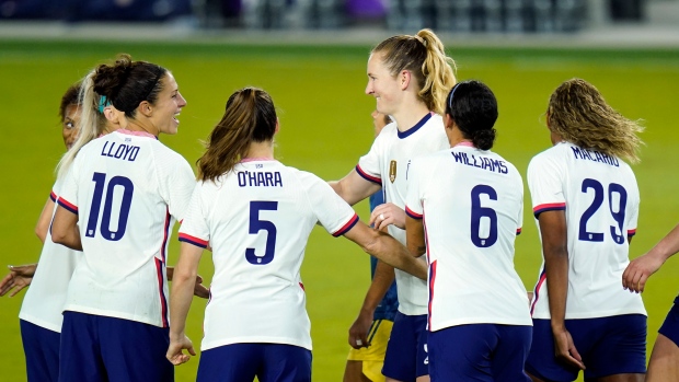 USWNT celebrates, The Canadian Press USWNT celebrates