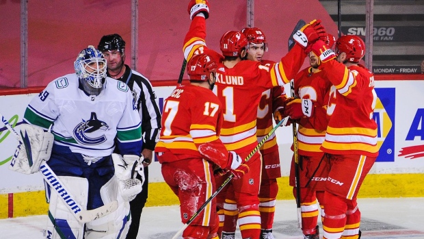 Flames Celebrate, The Canadian Press Flames Celebrate