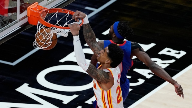 John Collins Jerami Grant , The Canadian Press John Collins Jerami Grant