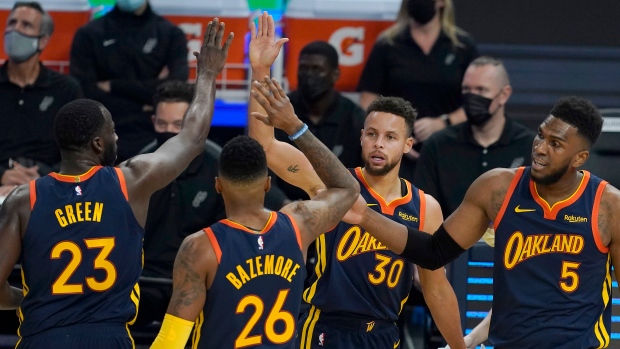 Golden State Warriors celebrate, The Canadian Press Golden State Warriors celebrate