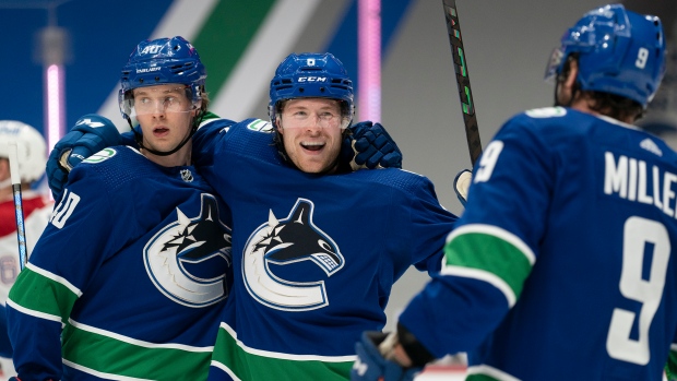 Vancouver Canucks celebrate, The Canadian Press Vancouver Canucks celebrate