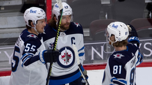 Mark Scheifele Kyle Connor Blake Wheeler, The Canadian Press Mark Scheifele Kyle Connor Blake Wheeler