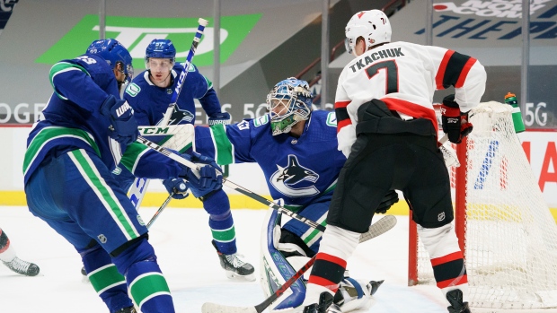 Vancouver Canucks celebrate, The Canadian Press Vancouver Canucks celebrate