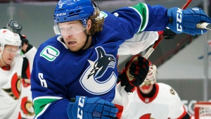 Canucks, Boeser agree to three-year, $19.95 million deal