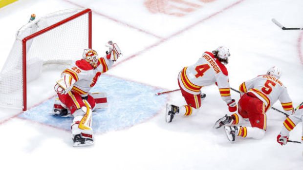 Jacob Markstrom, Rasmus Andersson and Mark Giordano, Getty Images Jacob Markstrom, Rasmus Andersson and Mark Giordano
