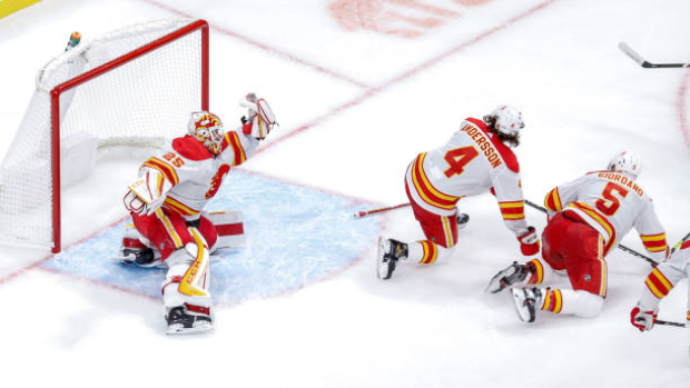 Jacob Markstrom, Rasmus Andersson and Mark Giordano