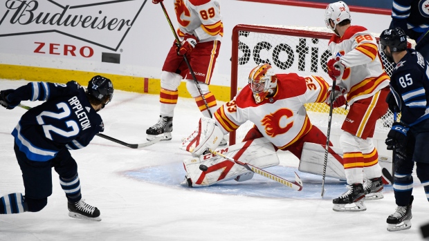 David Rittich makes a save on Mason Appleton