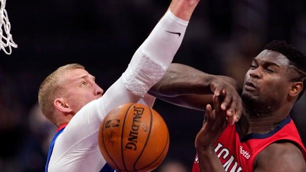 Mason Plumlee and Zion Williamson , The Canadian Press Mason Plumlee and Zion Williamson