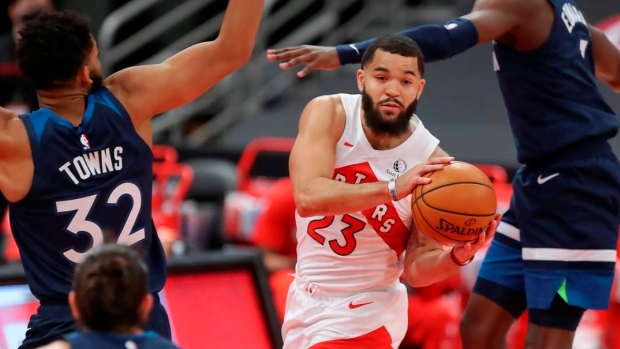 Fred VanVleet surrounded by Minnesota Timberwolves