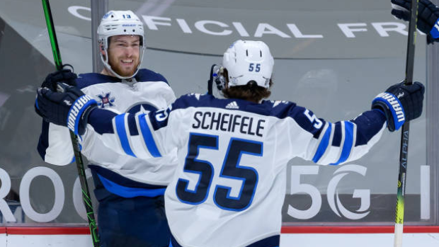 Pierre-Luc Dubois and Mark Scheifele celebrate, Getty Images Pierre-Luc Dubois and Mark Scheifele celebrate