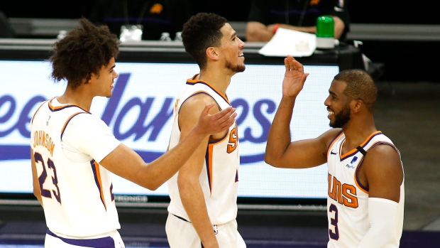 Cameron Johnson Devin Booker Chris Paul, The Canadian Press Cameron Johnson Devin Booker Chris Paul