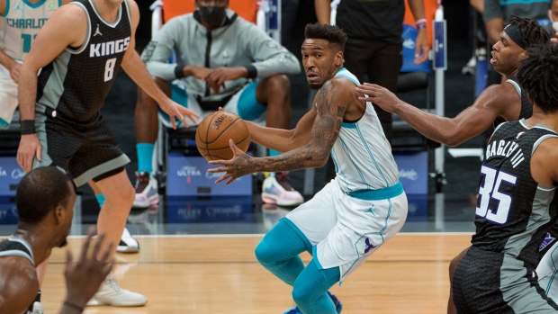 Malik Monk of the Charlotte Hornets reacts to a play during the game