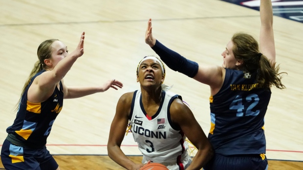 Canadian forward Aaliyah Edwards (3) of Connecticut controls the ball against Marquette, The Canadian Press Canadian forward Aaliyah Edwards (3) of Connecticut controls the ball against Marquette