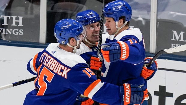 Cal Clutterbuck, Matt Martin Casey Cizikas, The Canadian Press Cal Clutterbuck, Matt Martin Casey Cizikas