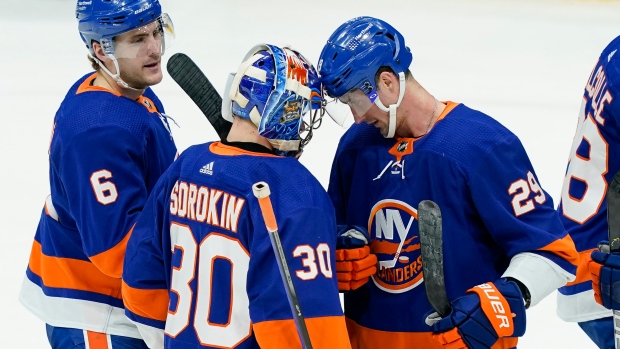 New York Islanders celebrate, The Canadian Press New York Islanders celebrate