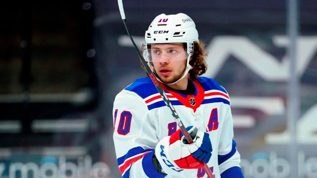 Artemi Panarin and Jacob Trouba of the New York Rangers discuss