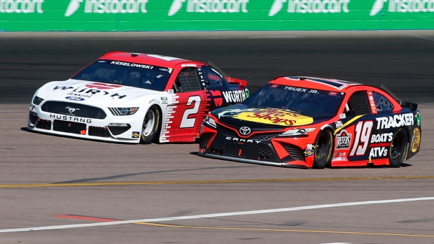 Martin Truex Jr (19) and Brad Keselowski (2), The Canadian Press Martin Truex Jr (19) and Brad Keselowski (2)