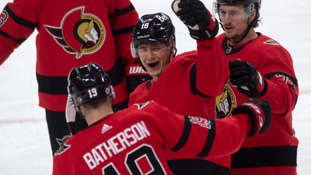 Tim Stützle and Drake Batherson celebrate