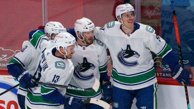Vancouver Canucks celebrate, The Canadian Press Vancouver Canucks celebrate