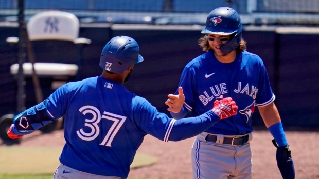 Teoscar Hernandez Bo Bichette, The Canadian Press Teoscar Hernandez Bo Bichette