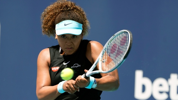 Japan's Osaka makes winning return, sets up Gauff showdown