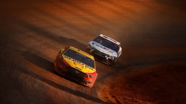 Joey Logano, Denny Hamlin, Getty Images Joey Logano, Denny Hamlin