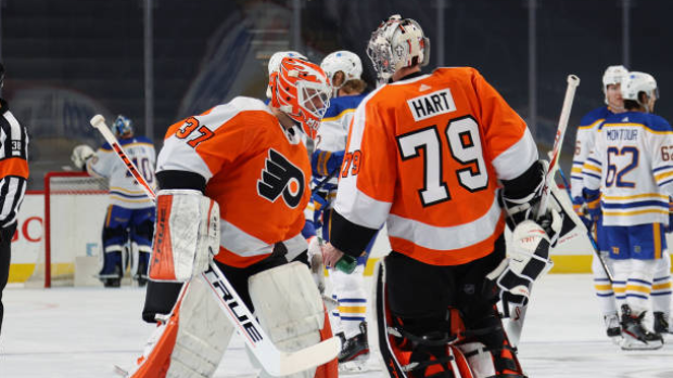 Carter Hart and Brian Elliott, Getty Images Carter Hart and Brian Elliott