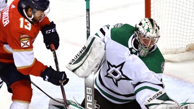 Anton Khudobin and Vinnie Hinostroza