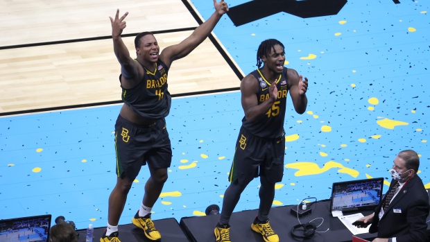 Mark Vital Davion Mitchell, Getty Images Mark Vital Davion Mitchell