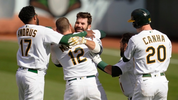 Mitch Moreland, Athletics celebrate, The Canadian Press Mitch Moreland, Athletics celebrate