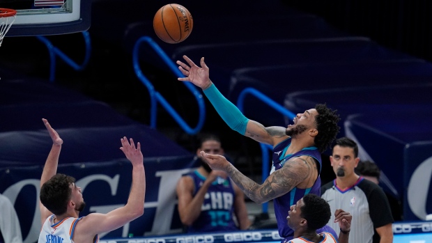 Charlotte Hornets' Miles Bridges shoot against Oklahoma City Thunder, The Canadian Press Charlotte Hornets' Miles Bridges shoot against Oklahoma City Thunder