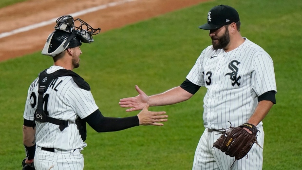 Lance Lynn Yasmani Grandal , The Canadian Press Lance Lynn Yasmani Grandal