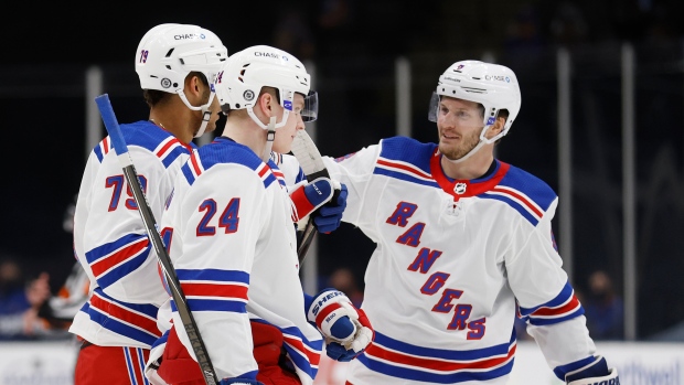 K'Andre Miller, Jacob Trouba and Kaapo Kakko