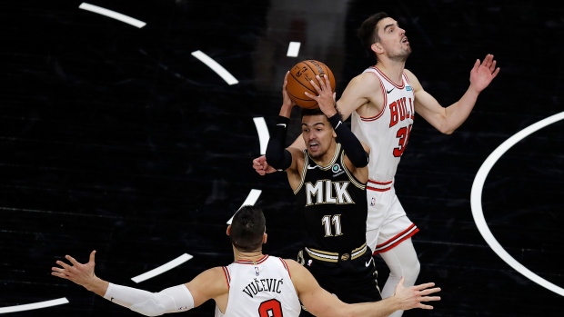 Atlanta Hawks' Trae Young passes against Chicago Bulls, The Canadian Press Atlanta Hawks' Trae Young passes against Chicago Bulls