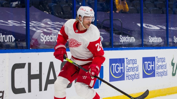 Jon Merrill excited to return home, help Red Wings defense 