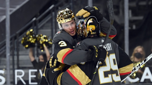 Brayden McNabb and Marc-Andre Fleury