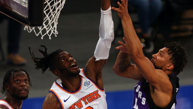 Nerlens Noel and Khem Birch, The Canadian Press Nerlens Noel and Khem Birch