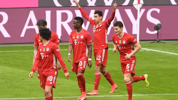 Jamal Musiala and Bayern Munich celebrate