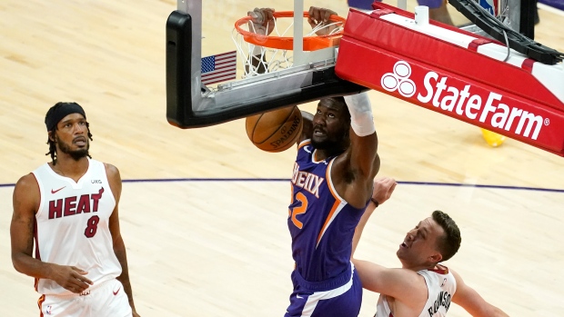 Phoenix Suns' Deandre Ayton scores against Miami Heat, The Canadian Press Phoenix Suns' Deandre Ayton scores against Miami Heat
