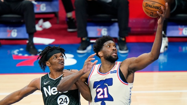 Alize Johnson Joel Embiid, The Canadian Press Alize Johnson Joel Embiid