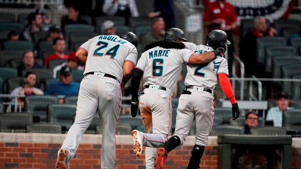Miami Marlins celebrate, The Canadian Press Miami Marlins celebrate