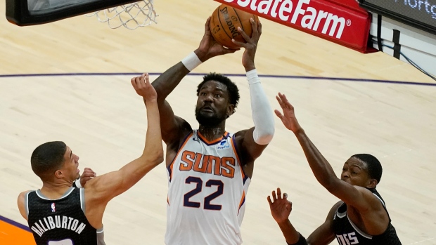 Phoenix Suns' Deandre Ayton shoots against Sacramento Kings